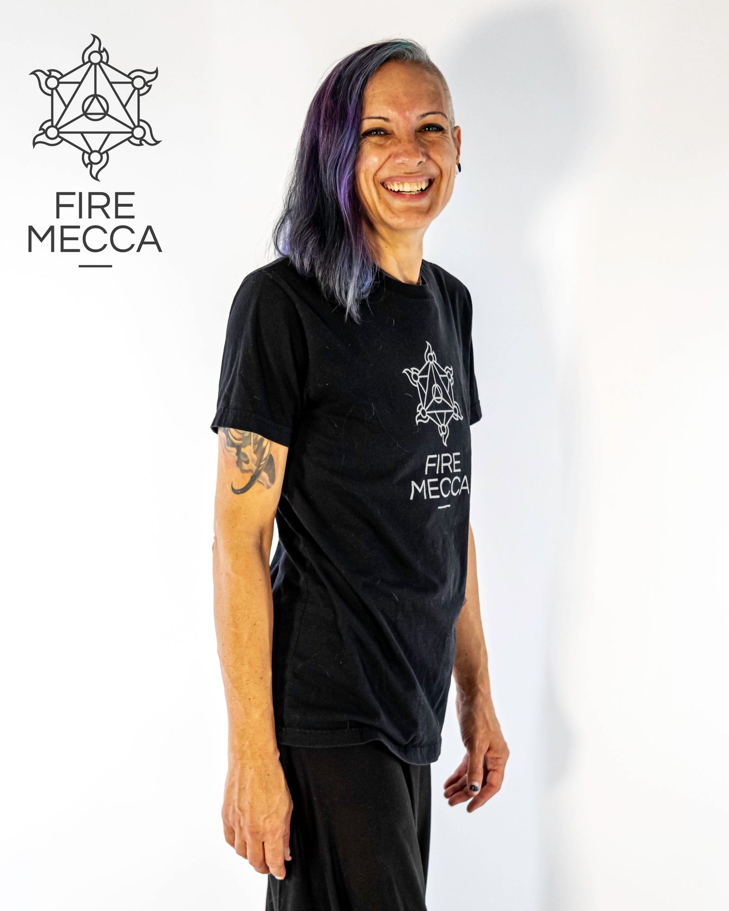 Fire Mecca Short Sleeve Shirt. Model: Corinne Vivers