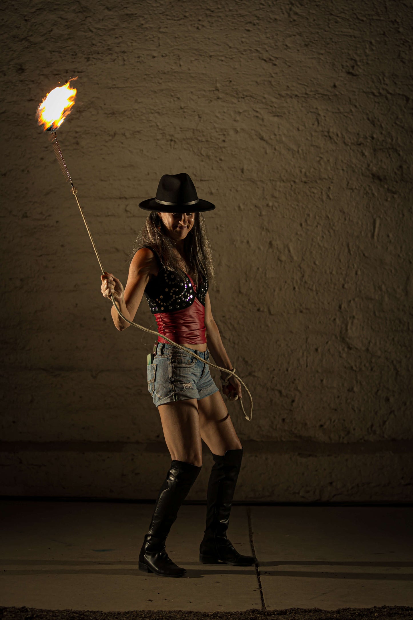 Fire props including a 12-foot cotton rope with a Kevlar moon blaze head for performances and festivals.
