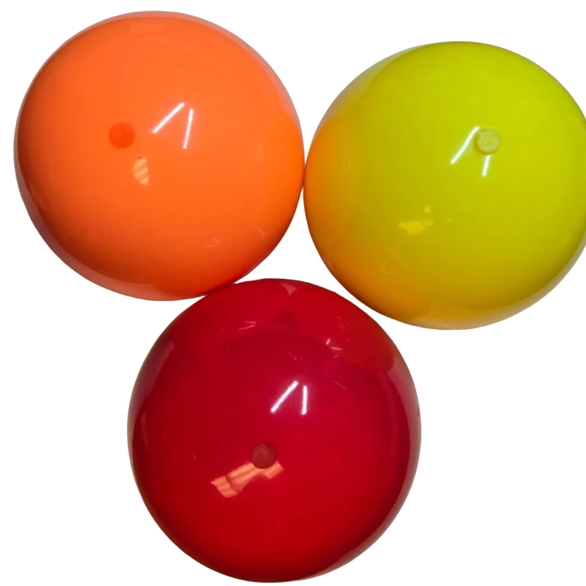 Three colorful silicone juggling balls on a white background. 