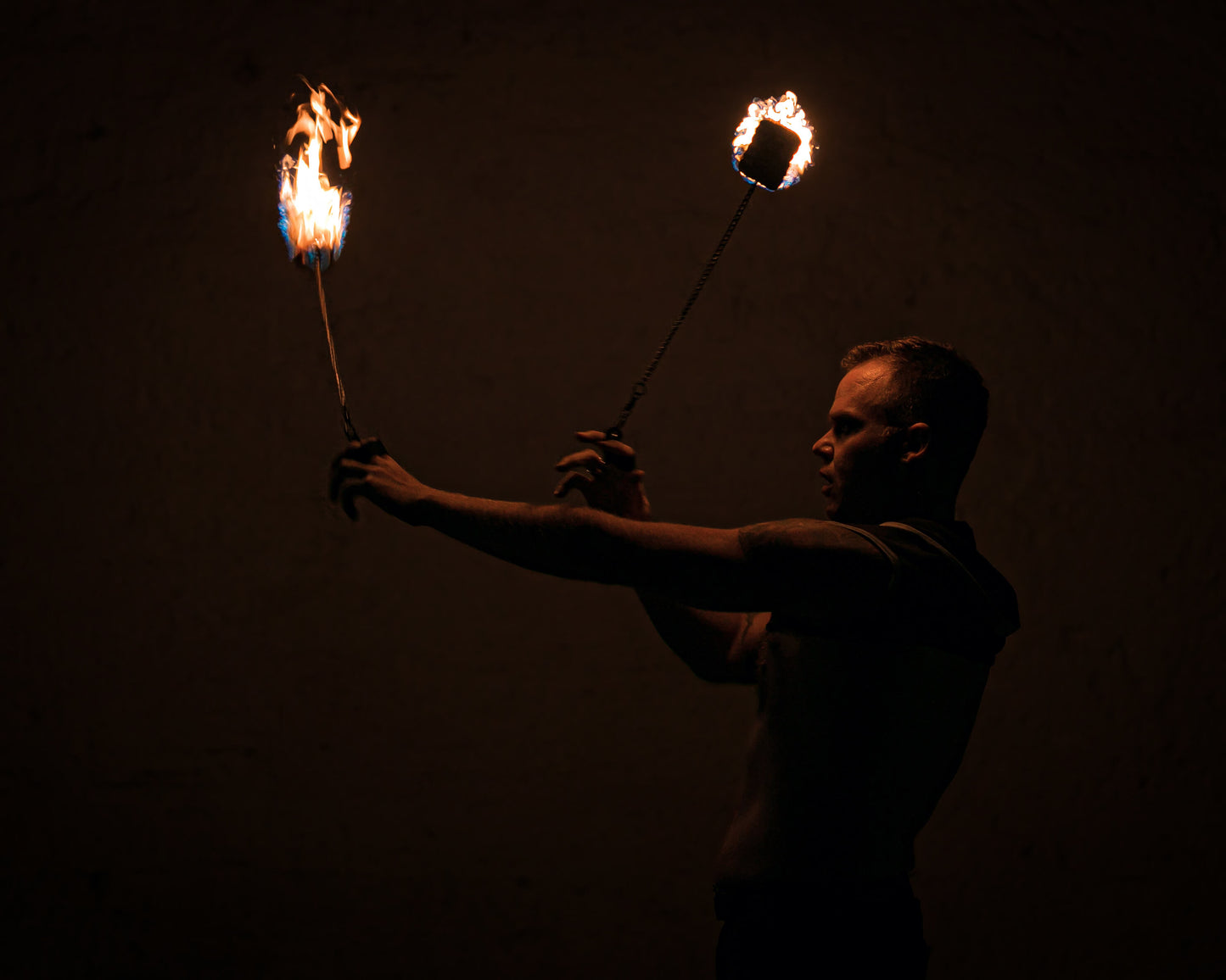 Fire props featuring a set of 2 Fire Poi with Kevlar heads for performances and festivals.