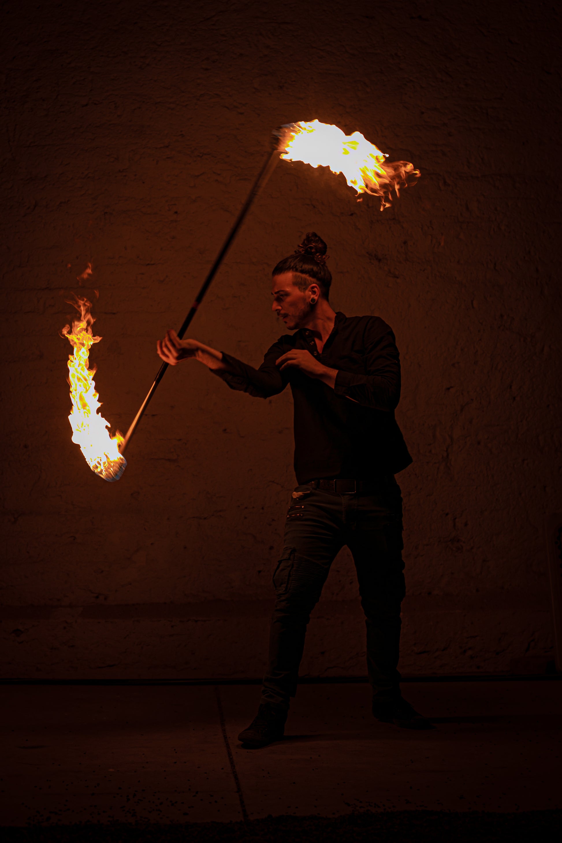 Fire props featuring a Kevlar fire staff for performances.